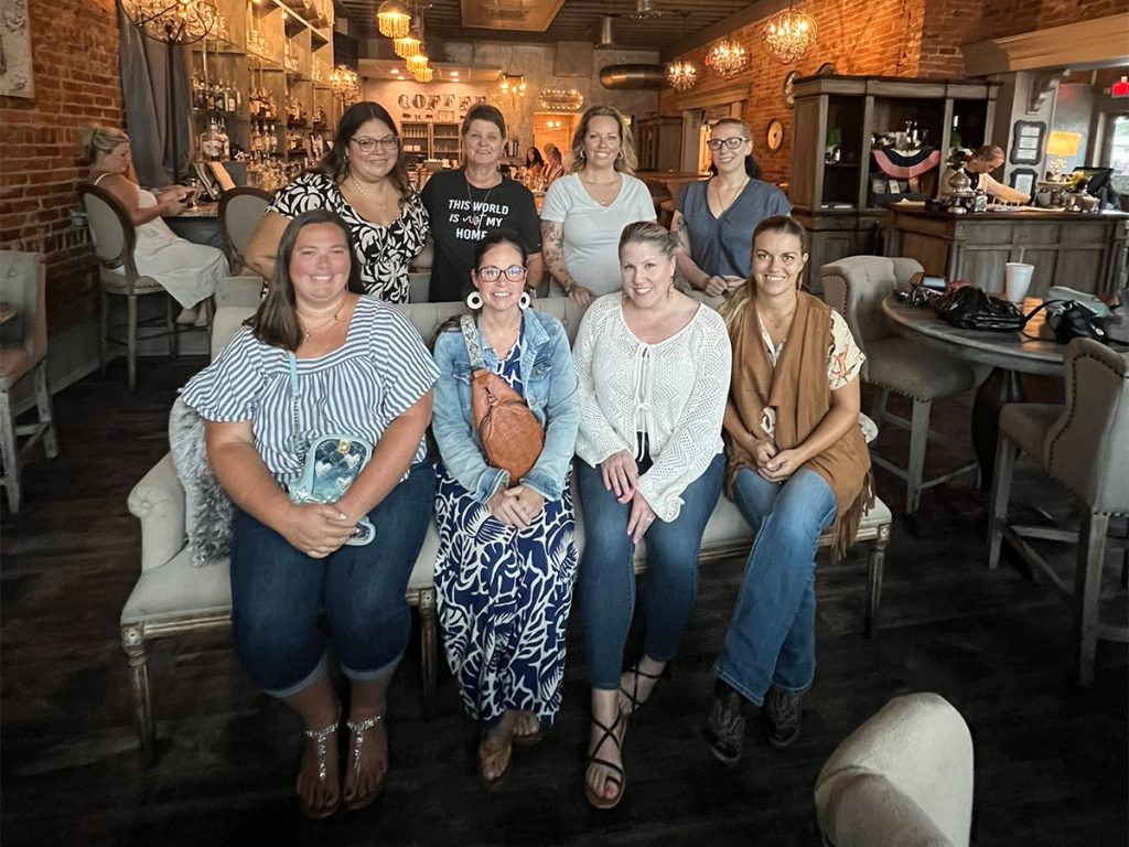 A group of military spouses gathered in a support group