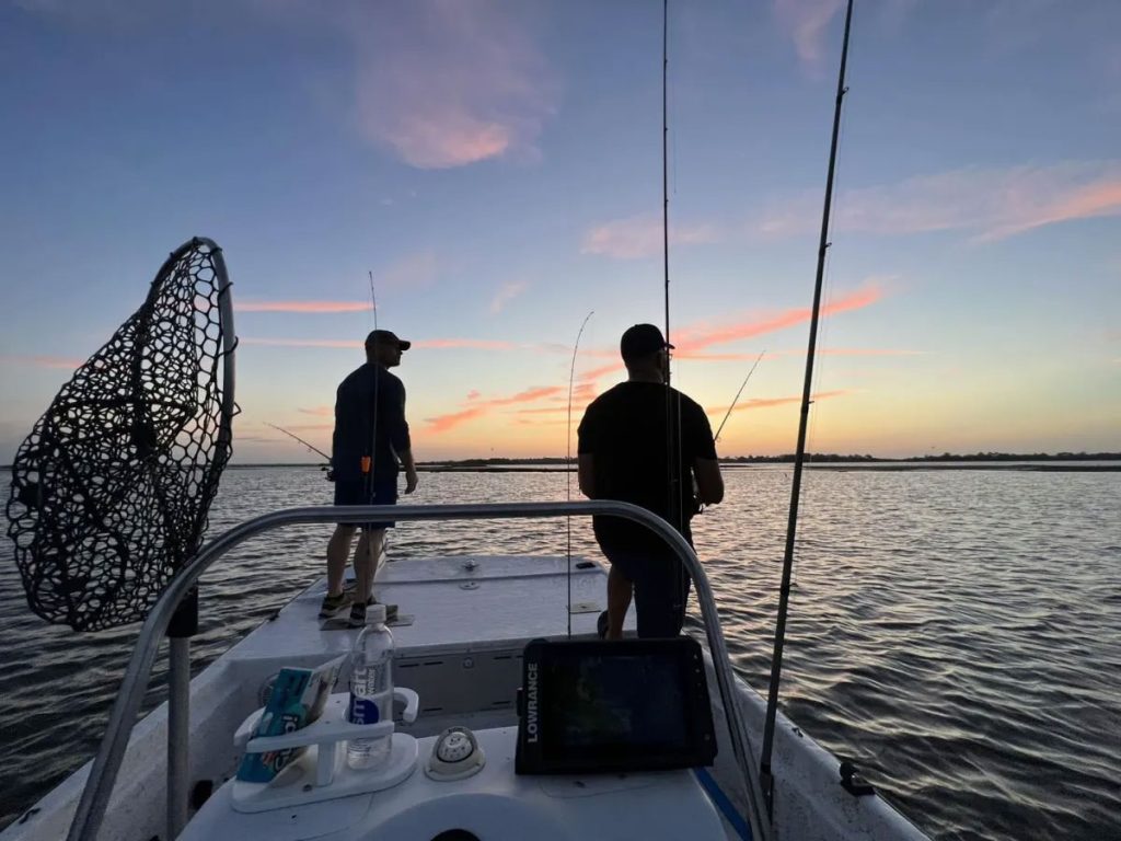 Veterans fishing in Florida at sunset